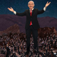 Newly elected leader Ron Paul delivers his acceptance speech to a crowd of tiny versions of himself on the planet New Texas.